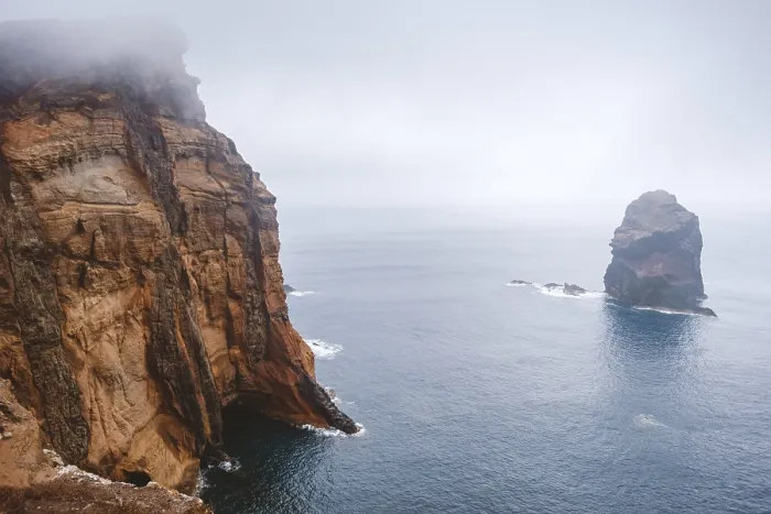 Framed Print : Foggy atmosphere at rocky shore of Madeira Island