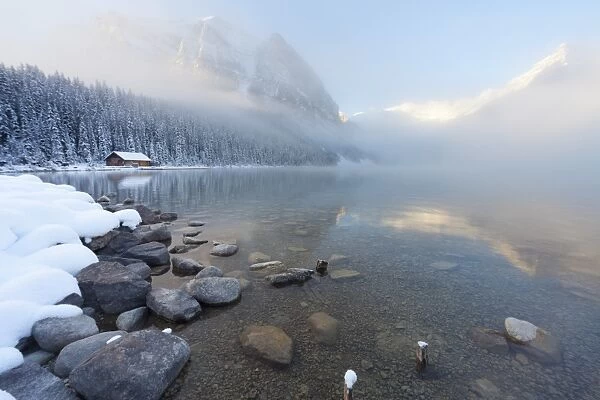 Foggy sunrise at Lake Louise, Banff National Park, UNESCO World Heritage Site, Rocky Mountains