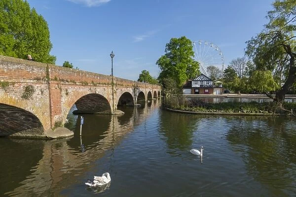 Footbridge over River Avon and ferris wheel, Stratford upon Avon, Warwickshire, England