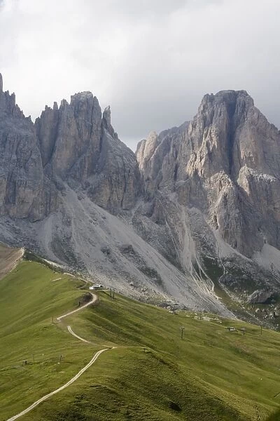 Footpath on ridge near Gruppo dei Sassolungo mountains, Dolomites, Italy, Europe