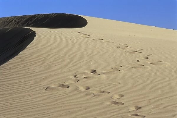 Footprints in sand, Maspalomas beach, Gran Canaria, Canary Islands, Spain, Europe