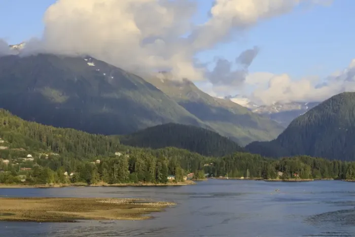 Framed Print : Forested mountains and wooden houses, from Sitka Sound, rare evening sun, summer Framed Print : Forested mountains and wooden houses, from Sitka Sound, rare evening sun, summer