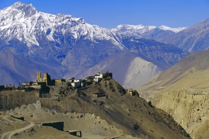 Framed Print : Fortified village of Jharkot and Nilgiri mountains in the background Framed Print : Fortified village of Jharkot and Nilgiri mountains in the background