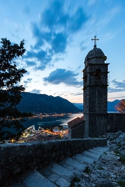 Part of the fortress walls and path above the old town of Kotor during the evening blue hour