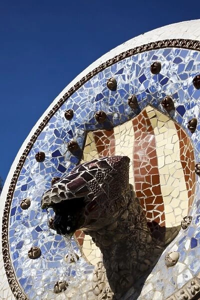 Fountain decorated with mosaics at the entrance to Parc Guell, Barcelona