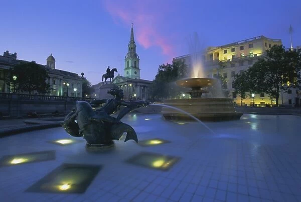 Fountains in Trafalgar Square at night, London, England, UK, Europe