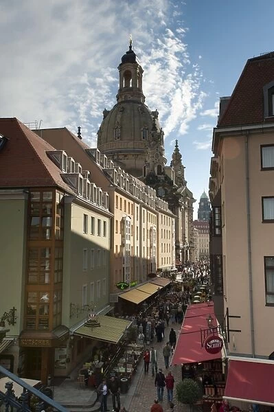 Frauenkirche looming over shopping area, Dresden, Saxony, Germany, Europe