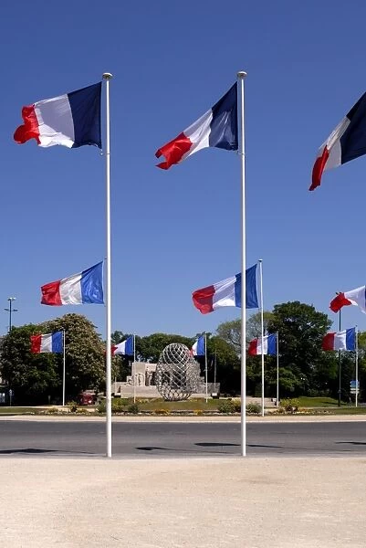 French flags and modern sculpture