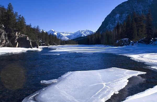 The frozen Bow River, Banff, Alberta, Canada, North America