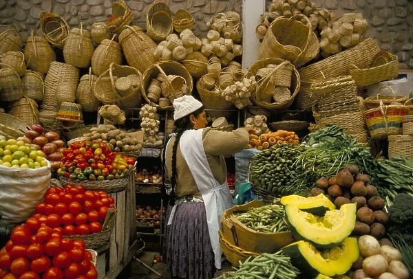Fruit, vegetables and baskets for sale on stall in market, Sucre, Bolivia, South America