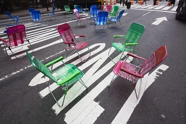 Garden chairs for pedestrians in Times Square, Midtown, Manhattan, New York City