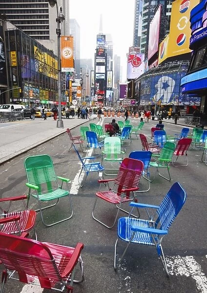 Garden chairs in the road for the public to sit and relax in the pedestrian zone