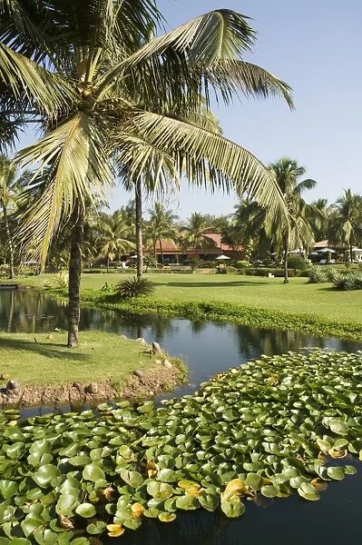The garden and golf course at the Leela Hotel