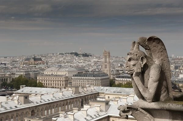 Gargoyle of Gothic Notre Dame Cathedral and the Right Bank with Basilica of Sacre Coeur, Paris, France, Europe