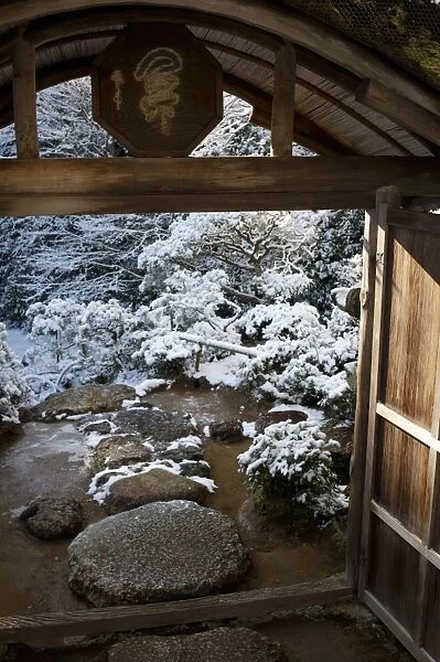 Gate on snowy Japanese garden, Okochi-sanso villa, Kyoto, Japan, Asia