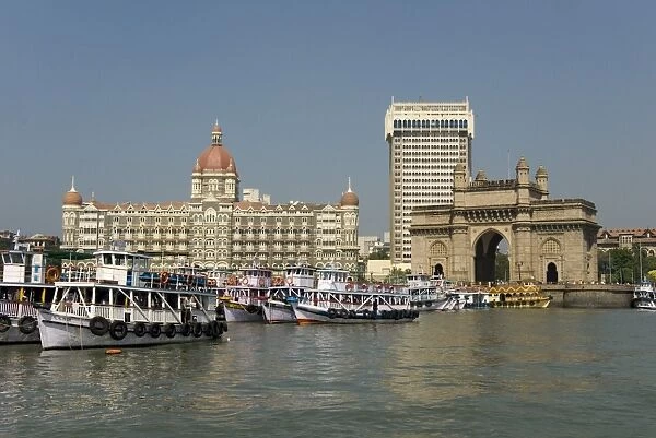 Gateway of India on the dockside beside the Taj Mahal Hotel, Mumbai, India, Asia