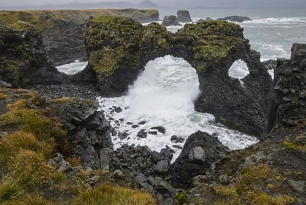Gatklettur basalt rock arch on the Snaefellsness Peninsula, Iceland, Polar Regions