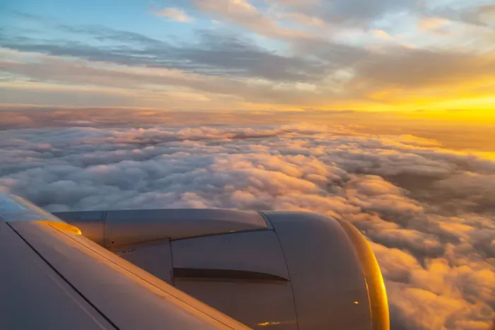 Framed Print : Generic view from airplane window of airplane wing and sunrise over England, United Framed Print : Generic view from airplane window of airplane wing and sunrise over England, United