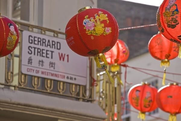 Gerrard Street, Chinatown, during Chinese New Year celebrations colourful lanterns decorate the surrounding streets, Soho, London, England, United