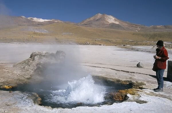 Geyser in pool in sinter basin, El Tatio geyser basin on altiplano, Atacama Desert
