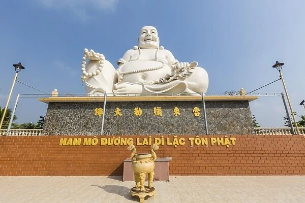 Giant Buddha statue at Vinh Trang Pagoda, My Tho, Vietnam, Indochina, Southeast Asia
