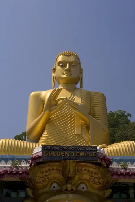 Framed Print : Giant gold seated Buddha statue at entrance to the Cave Temples Framed Print : Giant gold seated Buddha statue at entrance to the Cave Temples