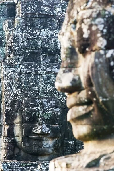 Giant heads at the Bayon temple, UNESCO World Heritage Site, Angkor, Siem Reap, Cambodia