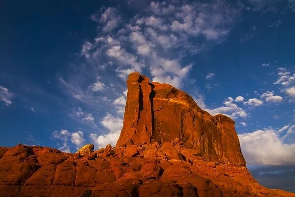 Giant rock in the late afternoon light on top of a plateau near Moab, Utah, United States of America, North America