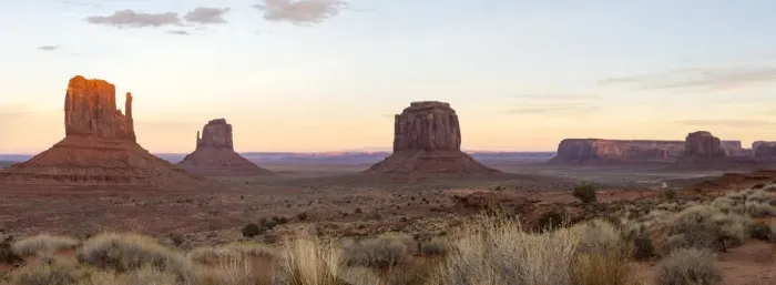 Framed Print : The giant sandstone buttes glowing pink at sunset in Monument Valley Navajo Tribal Framed Print : The giant sandstone buttes glowing pink at sunset in Monument Valley Navajo Tribal