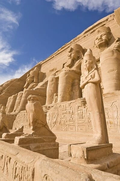 Giant statues of the great pharaoh Rameses II outside the relocated Temple of Rameses II at Abu Simbel, UNESCO World Heritage Site, Egypt, North