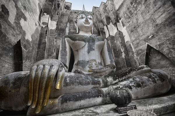 A giant Sukhothai era sitting Buddha, Wat Si Chum, Sukhothai Historical Park, UNESCO