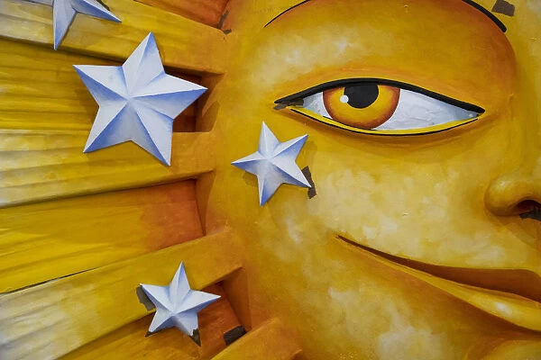 Detail of a giant sunshine made of styrofoam that will appear on a Mardis Gras float