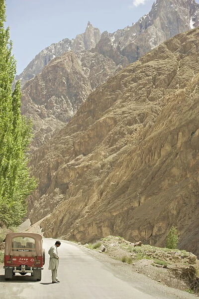 Gilgit jeep and driver on the Karakoram highway or KKH