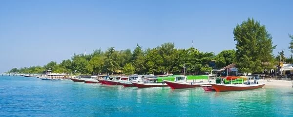 Gili Trawangan harbour, traditional boats on the crystal clear ocean at Gili Trawangan, Gili Islands, Indonesia, Southeast Asia, Asia