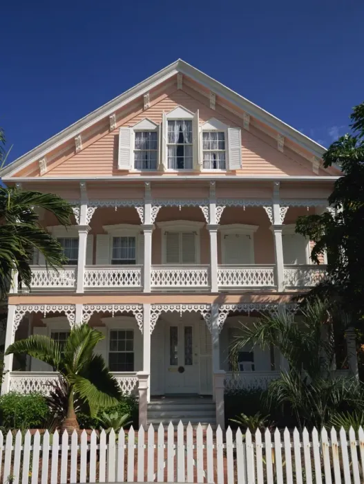 Framed Print : A gingerbread house with white fretwork and verandah Framed Print : A gingerbread house with white fretwork and verandah