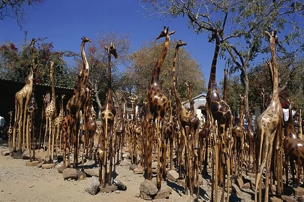 Giraffe carvings for sale, Victoria Falls town, Zimbabwe, Africa