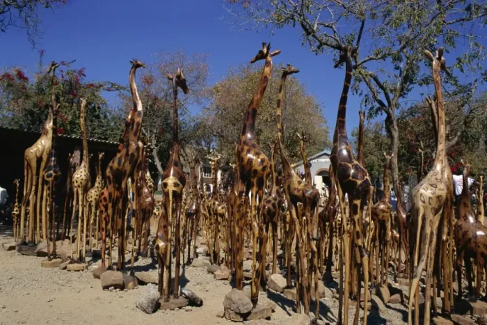 Framed Print : Giraffe carvings for sale, Victoria Falls town, Zimbabwe, Africa Framed Print : Giraffe carvings for sale, Victoria Falls town, Zimbabwe, Africa