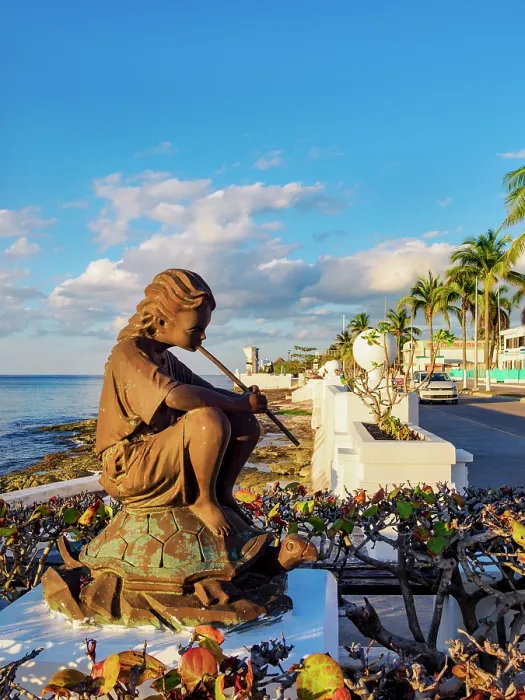 Framed Print : Girl playing the flute on a tortoise sculpture at the waterfront of San Miguel de Cozumel, Cozumel Island, Quintana Roo State, Mexico Framed Print : Girl playing the flute on a tortoise sculpture at the waterfront of San Miguel de Cozumel, Cozumel Island, Quintana Roo State, Mexico
