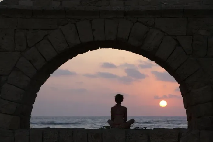 Framed Print : Girl watching sunset in Cesarea, Israel, Middle East