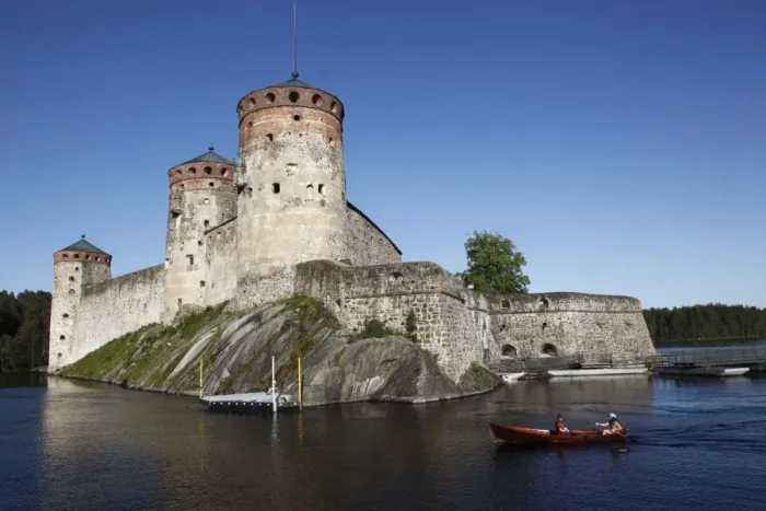 Framed Print : Girls relaxing beside Olavinlinna Medieval Castle (St. Olafs Castle) Framed Print : Girls relaxing beside Olavinlinna Medieval Castle (St. Olafs Castle)
