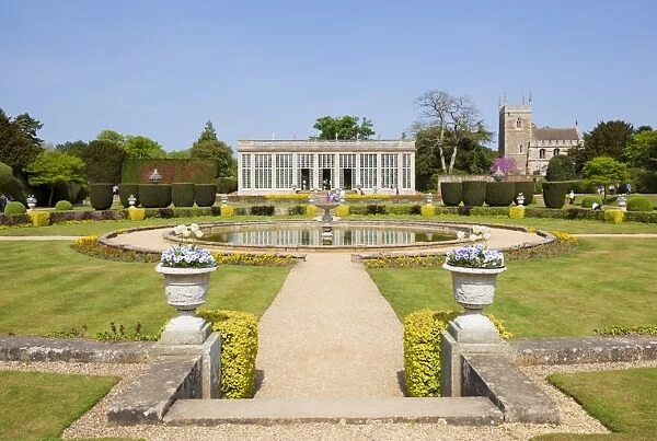 The glass fronted restored Orangery and Conservatory in the formal gardens of Belton House