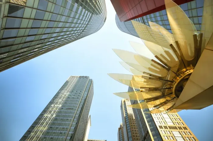 Framed Print : Glass and golden metal Lotus installation in front of HSBC Bank with surrounding Framed Print : Glass and golden metal Lotus installation in front of HSBC Bank with surrounding