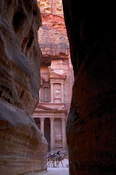 Glimpse of the Treasury from the Siq, Petra, UNESCO World Heritage Site, Jordan, Middle East