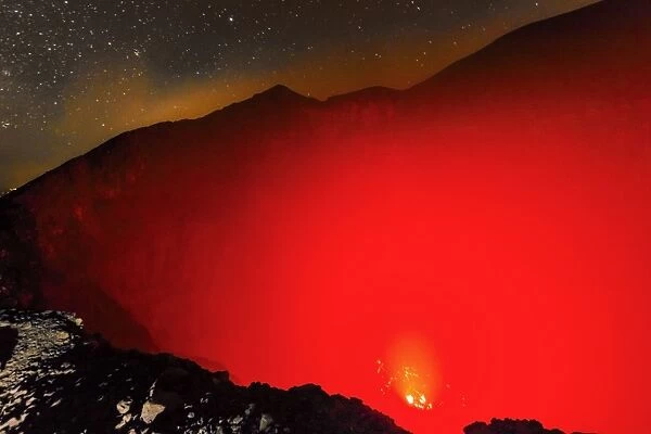 Glowing active 700m wide volcanic crater of Volcan Telica with lava vents far below, in the North West volcanic chain, Leon, Nicaragua, Central America