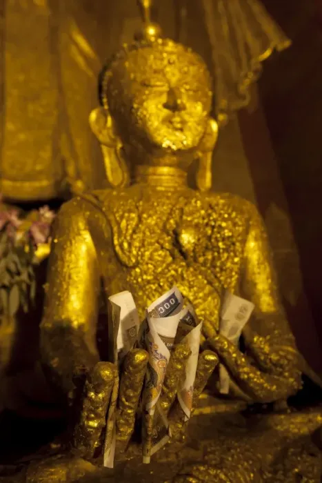 Framed Print : Gold Buddha with money offering in hand, Bagan, Central Myanmar, Myanmar Framed Print : Gold Buddha with money offering in hand, Bagan, Central Myanmar, Myanmar