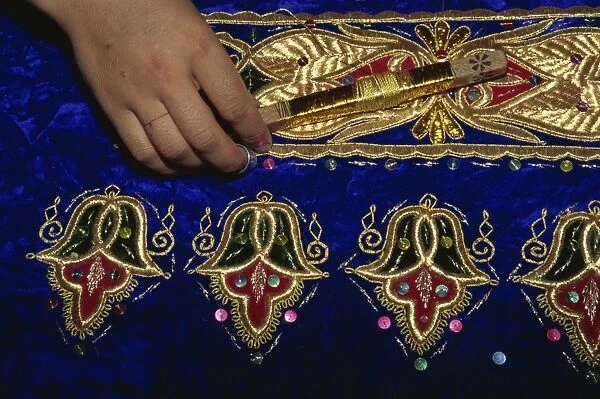 Detail of gold embroidery work in embroidery factory, Bukhara, Uzbekistan