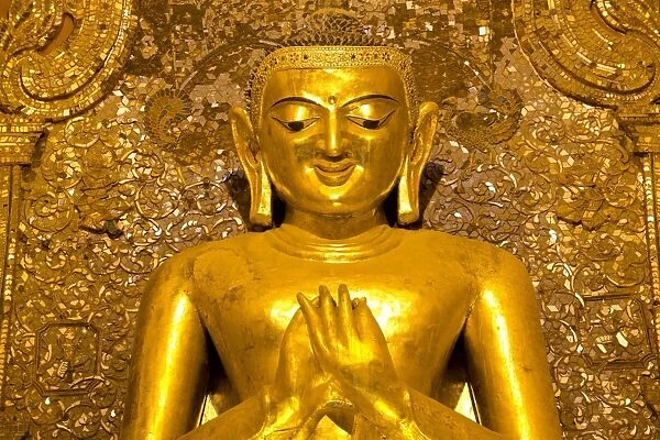 Golden Buddha image standing 33ft tall inside Ananda Paya, Bagan, Myanmar (Burma), Southeast Asia