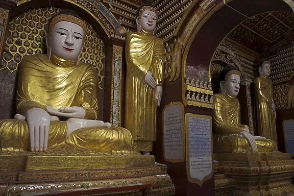 Golden Buddhas inside the paya, Thanboddhay Paya built in the 20th century by Moehnyin Sayadaw
