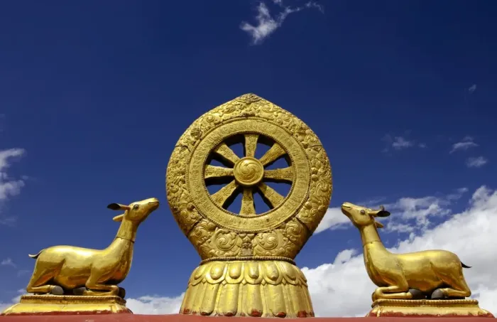 Framed Print : A golden dharma wheel and deer sculptures on the sacred Jokhang Temple roof, Barkhor Square, Lhasa, Tibet, China Framed Print : A golden dharma wheel and deer sculptures on the sacred Jokhang Temple roof, Barkhor Square, Lhasa, Tibet, China