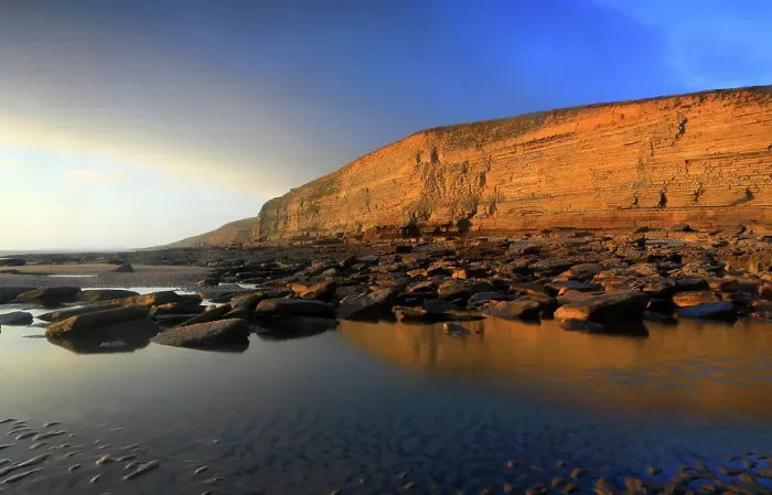Framed Print : Golden evening light on the cliffs in winter at Dunraven Bay, Southerndown, Bridgend, South Wales, United Kingdom Framed Print : Golden evening light on the cliffs in winter at Dunraven Bay, Southerndown, Bridgend, South Wales, United Kingdom
